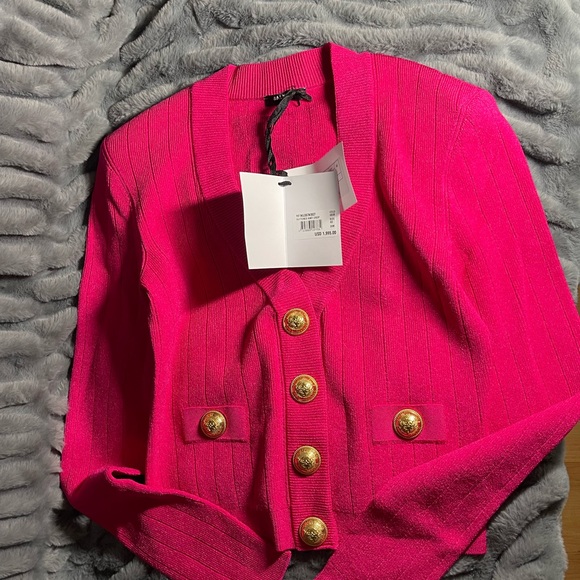 Balmain
Balmain Button Embellished Ribbed Cardigan - Picture 4 of 8